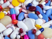 white blue and orange medication pill