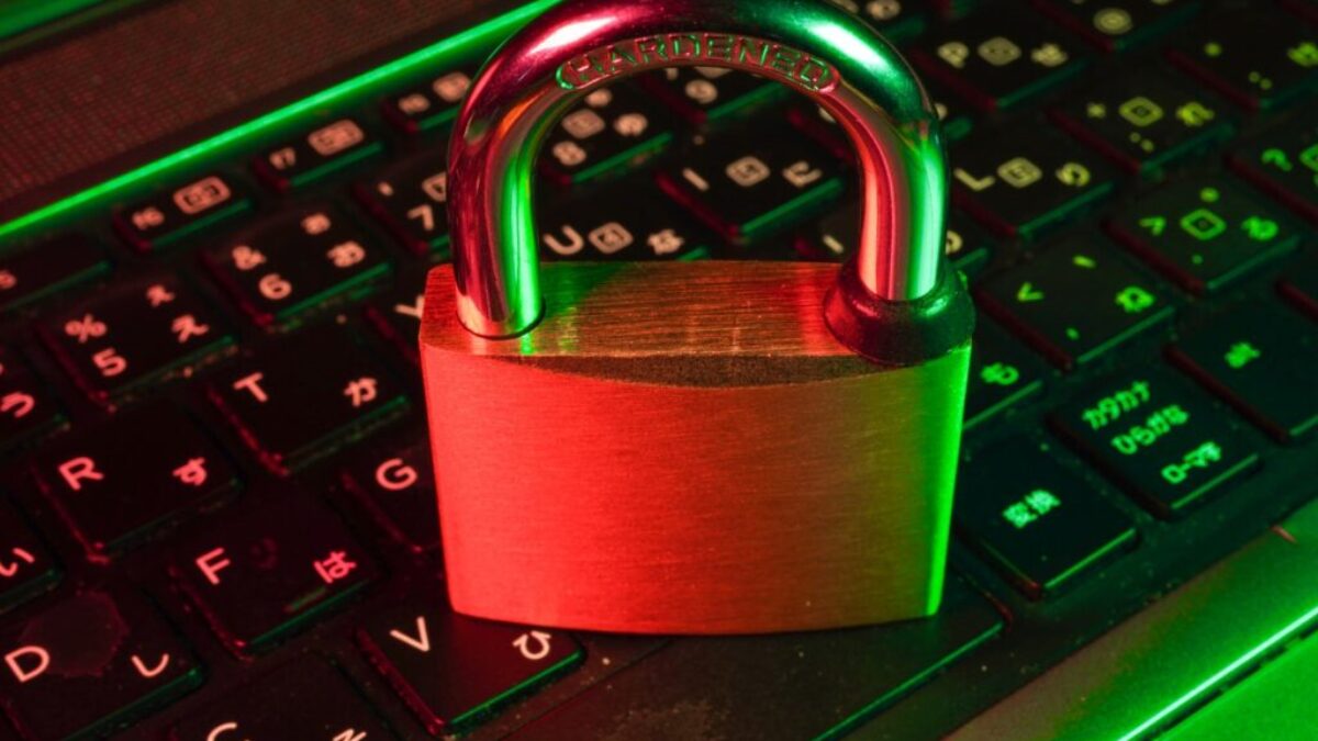 red padlock on black computer keyboard