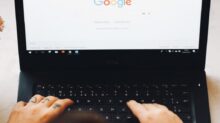 person using black laptop computer
