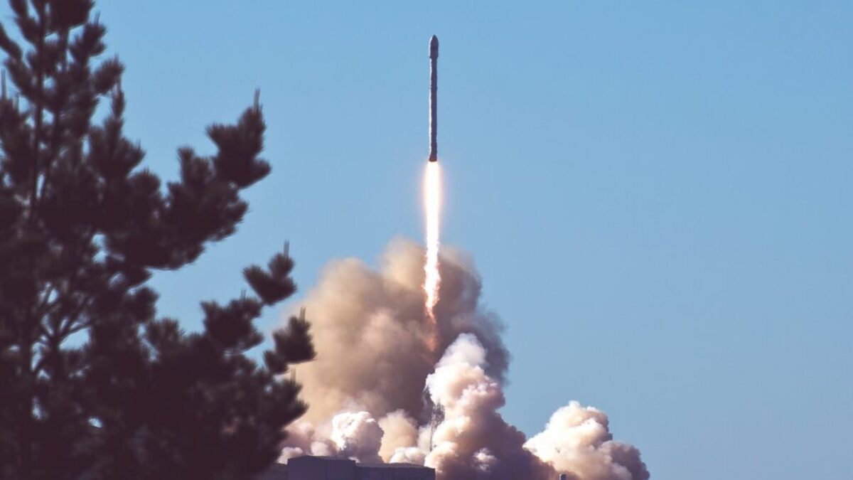 photo of space shuttle launching rocket
