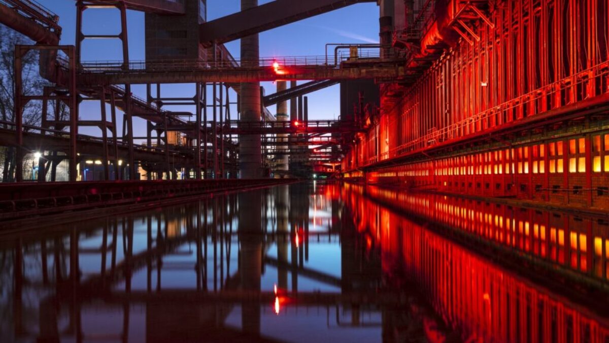 red and black bridge over water