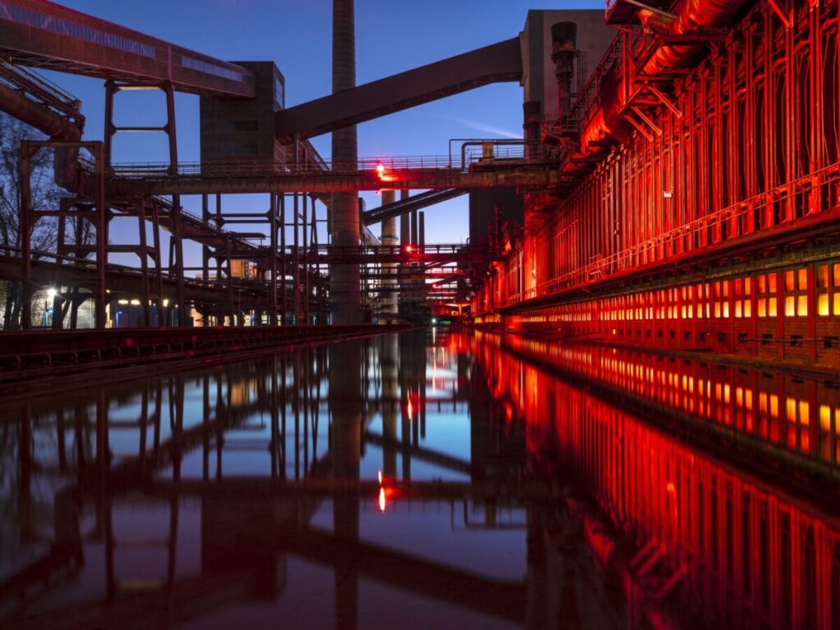 red and black bridge over water