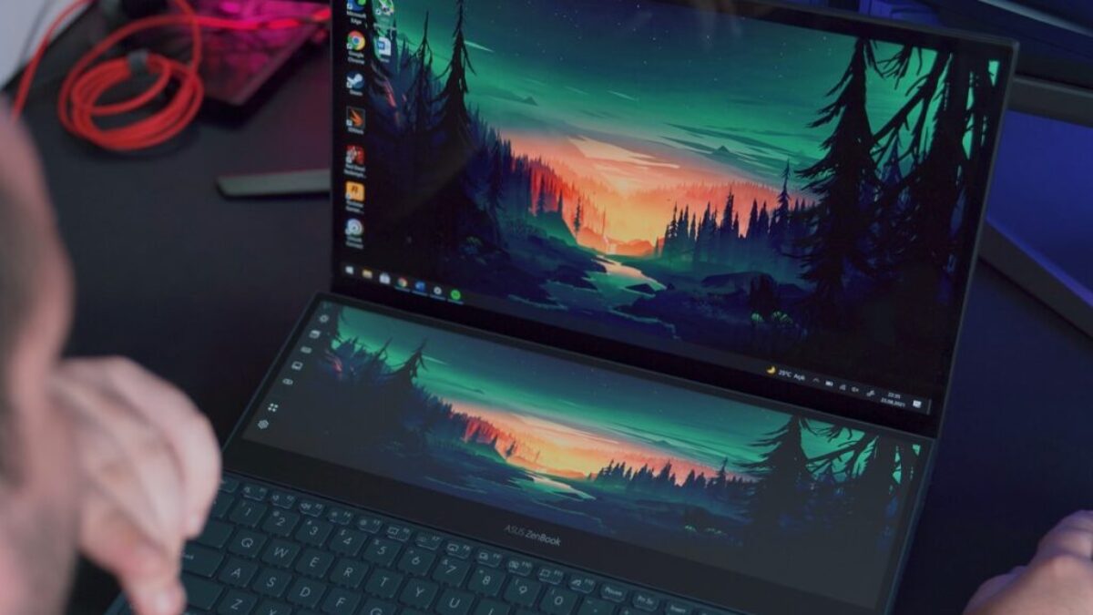 black laptop computer turned on displaying green and yellow lights