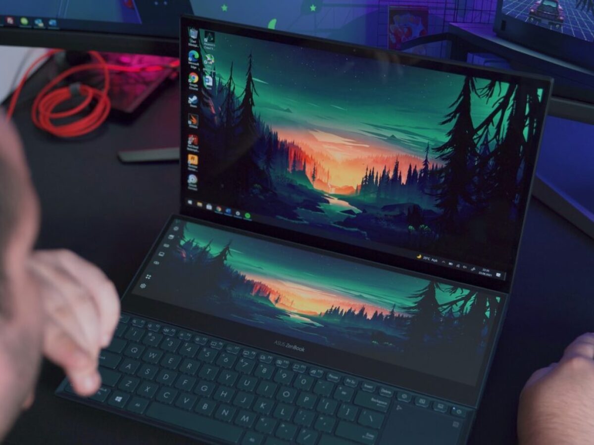 black laptop computer turned on displaying green and yellow lights