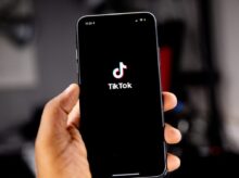 person holding black iphone 5