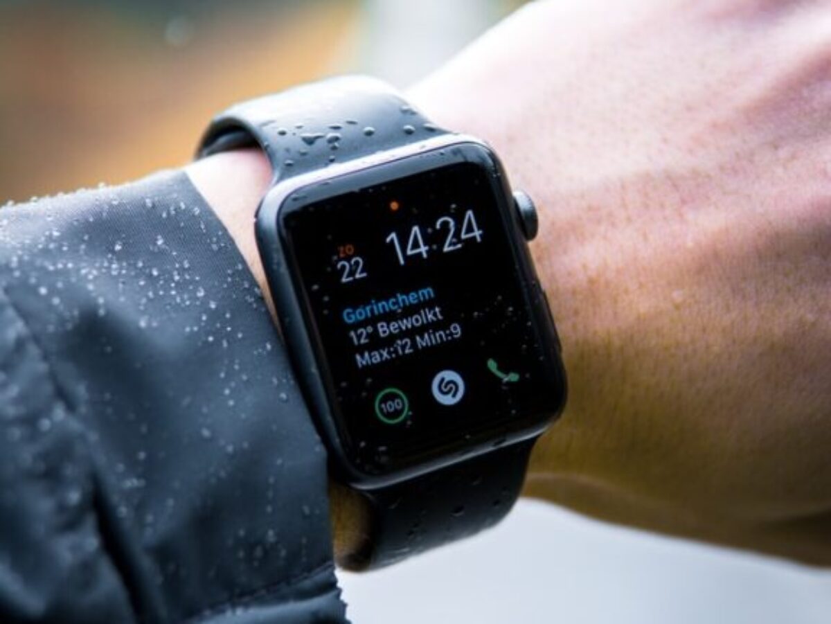 person wearing Apple Watch at 14:24