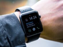 person wearing Apple Watch at 14:24