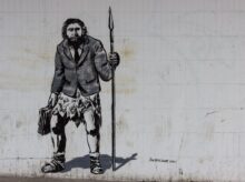 man holding spear wall painting