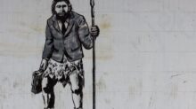 man holding spear wall painting