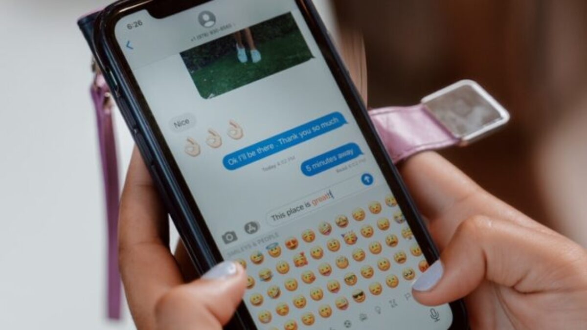 Close-Up Shot of a Person Sending Text Message