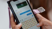 Close-Up Shot of a Person Sending Text Message