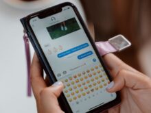 Close-Up Shot of a Person Sending Text Message