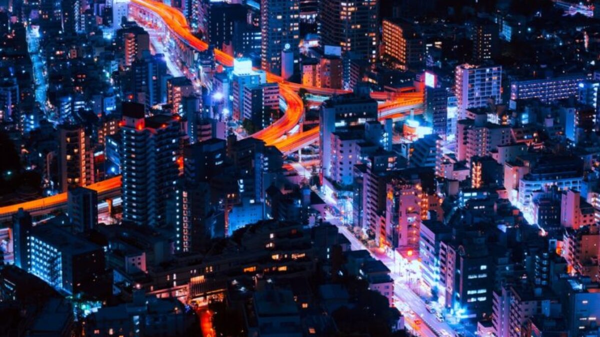 timelapse photography of vehicles and buildings