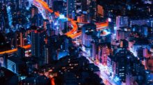timelapse photography of vehicles and buildings