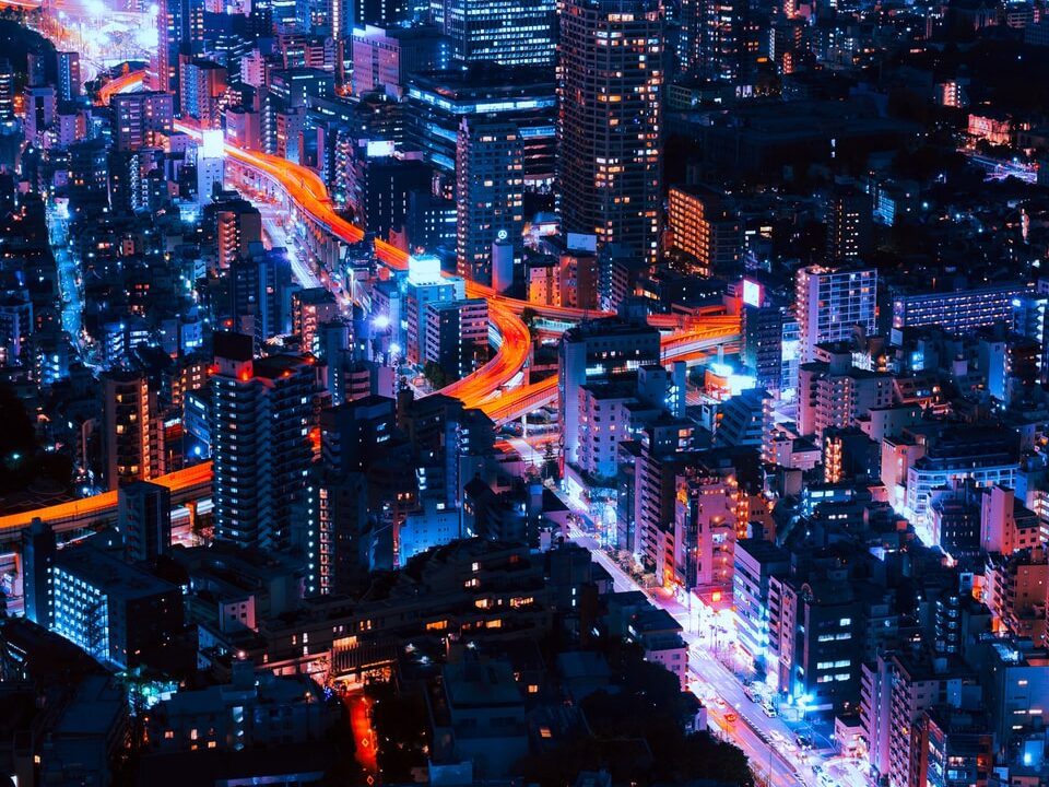 timelapse photography of vehicles and buildings