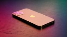 Silver Iphone 6 on Black Book