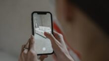 Person Holding Black Iphone