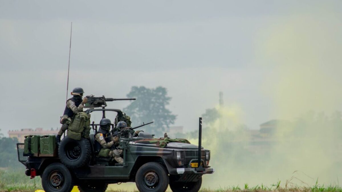 A Soldier Driving Military Vehicle