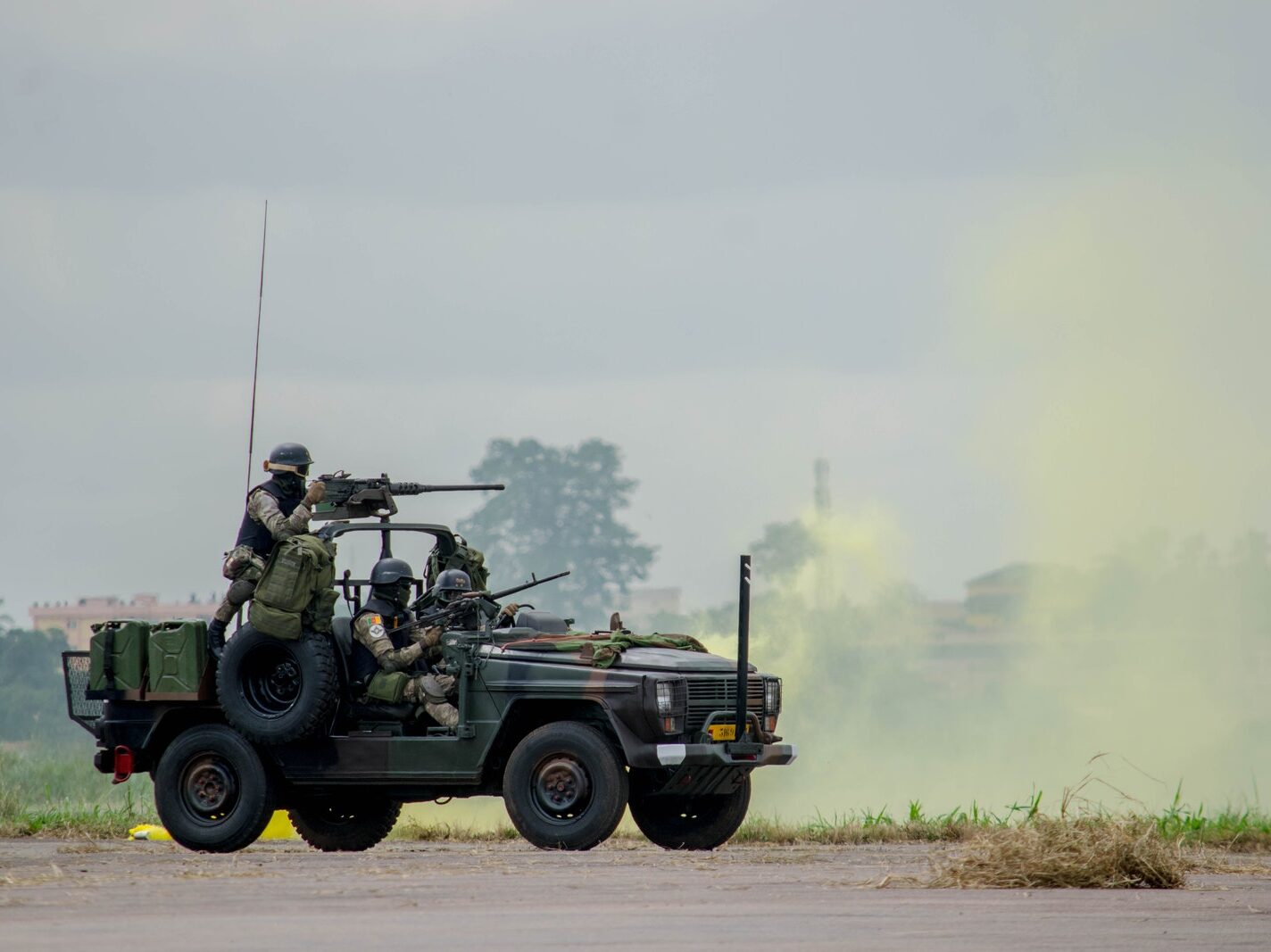 A Soldier Driving Military Vehicle