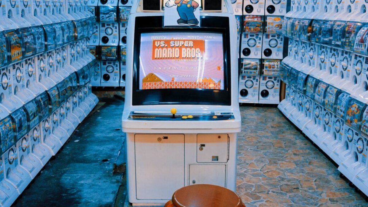 black flat screen tv on white wooden tv rack