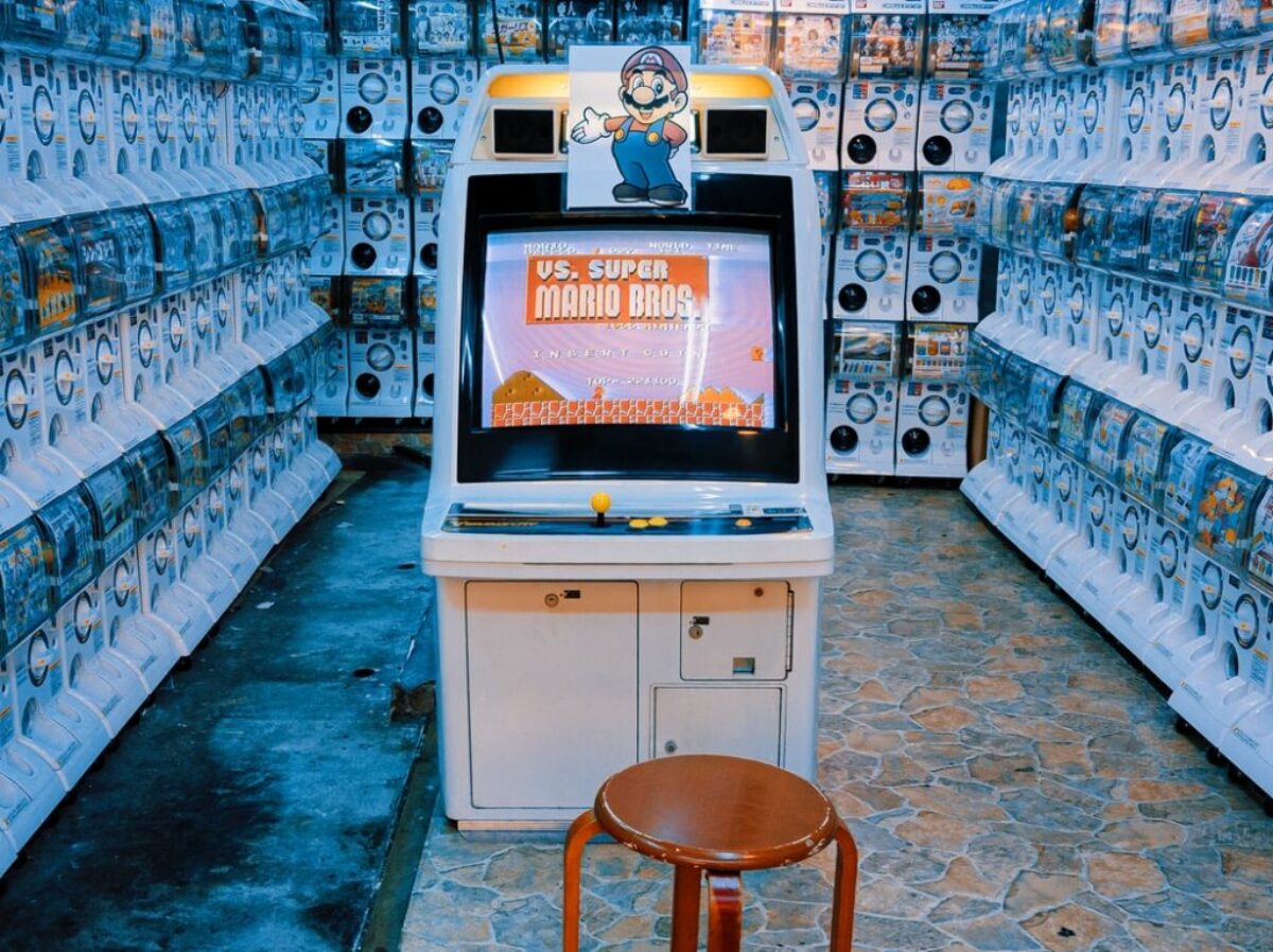 black flat screen tv on white wooden tv rack