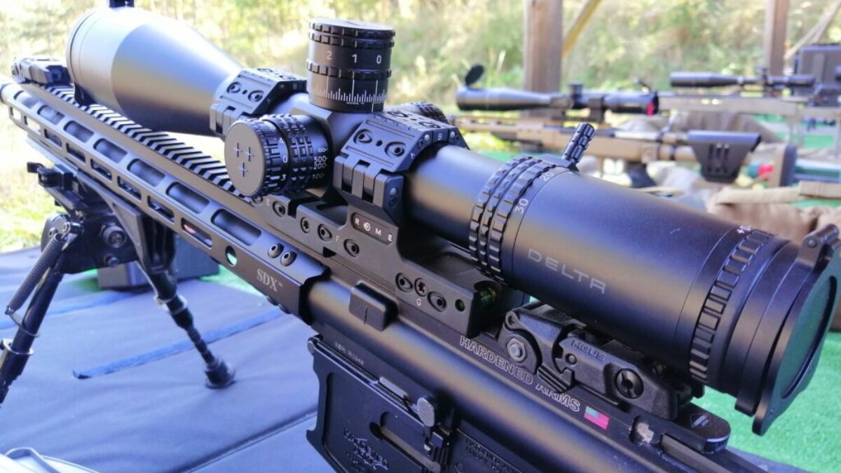black rifle on blue table