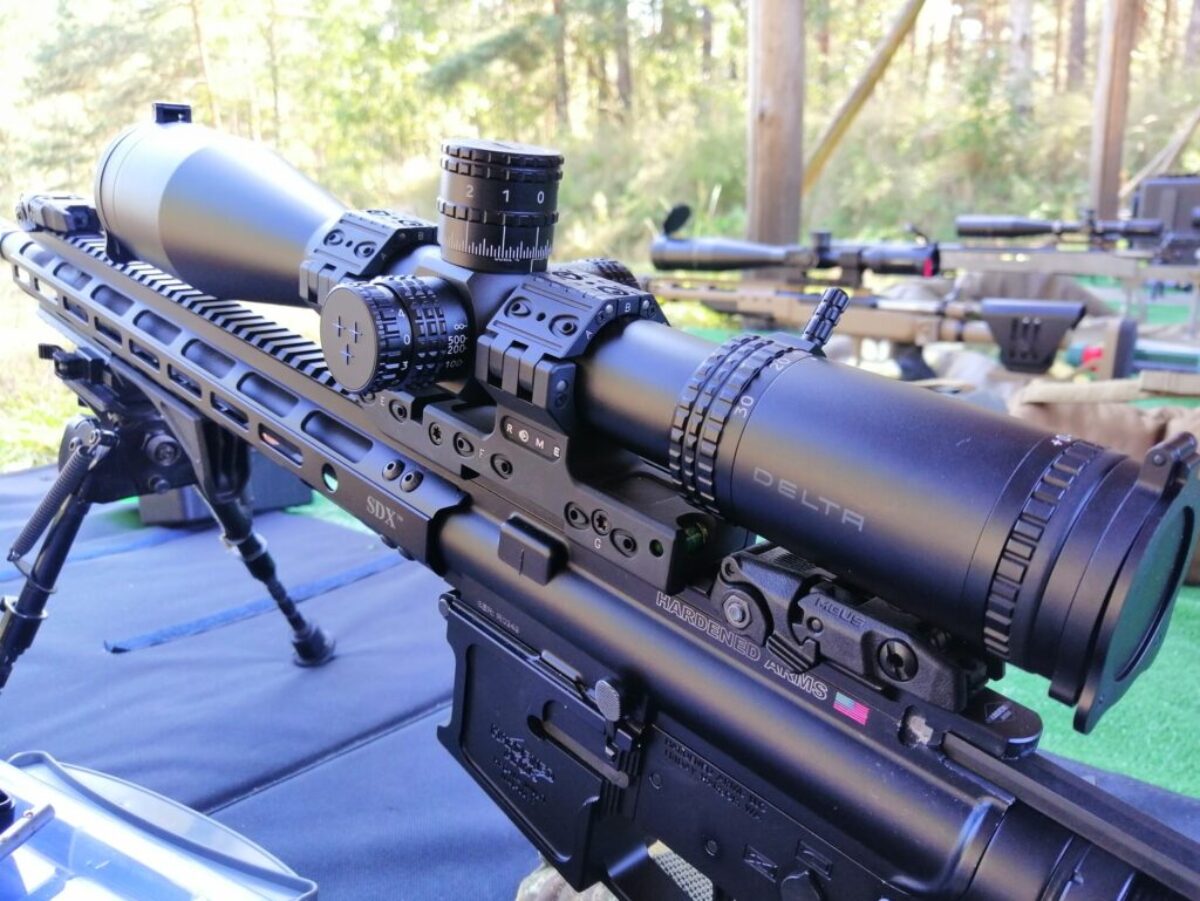 black rifle on blue table