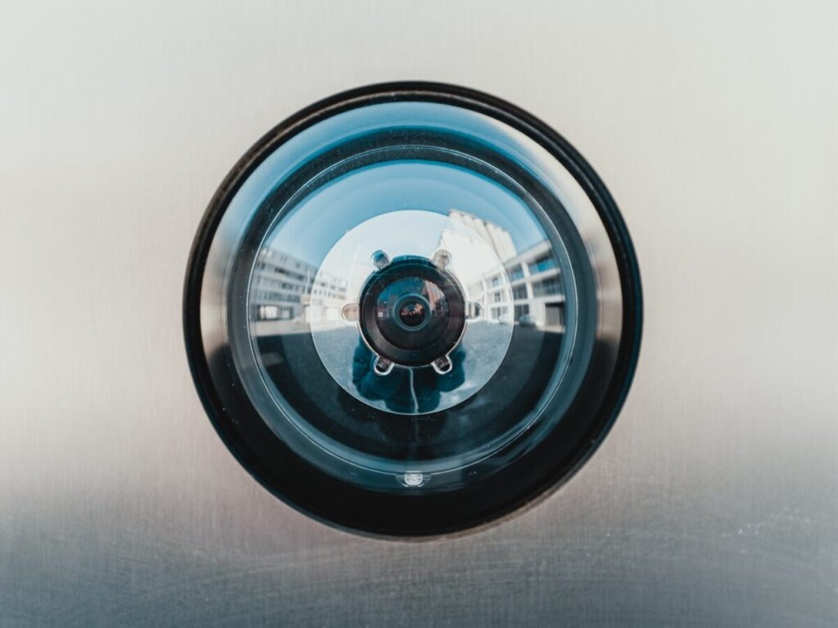 selective focus photography of lens