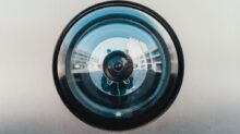 selective focus photography of lens