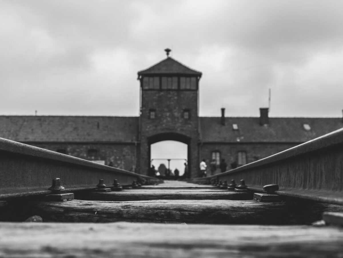 grayscale photo of concrete bridge