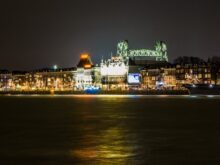 city lights turned on during night time