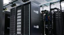 img IX mining rig inside white and gray room