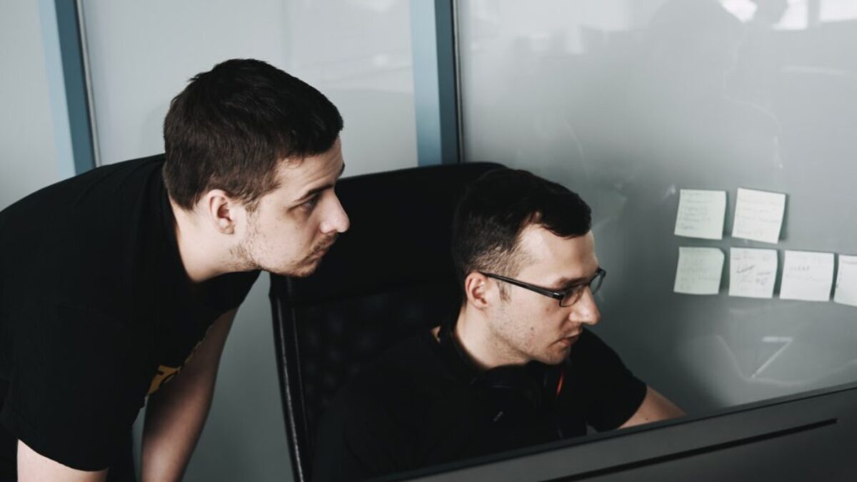man in black tank top wearing eyeglasses