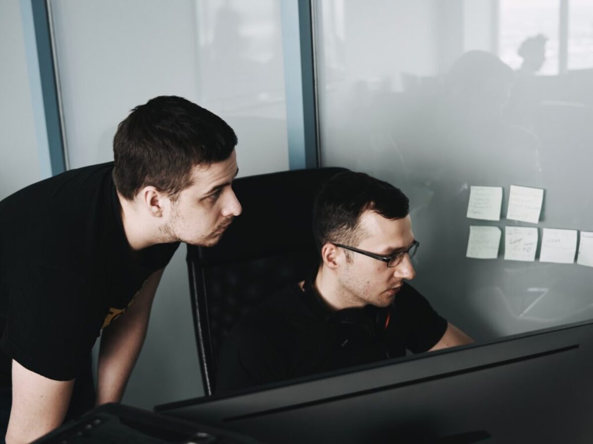 man in black tank top wearing eyeglasses