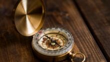 shallow focus photo of compass