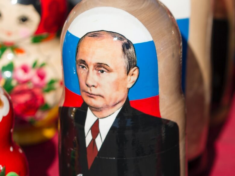 Donald Trump nesting dolls on red textile