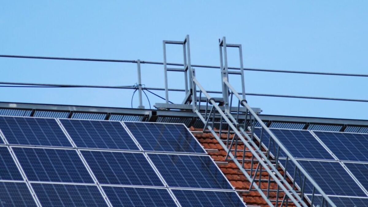 solar panels on gray metal frame under blue sky during daytime