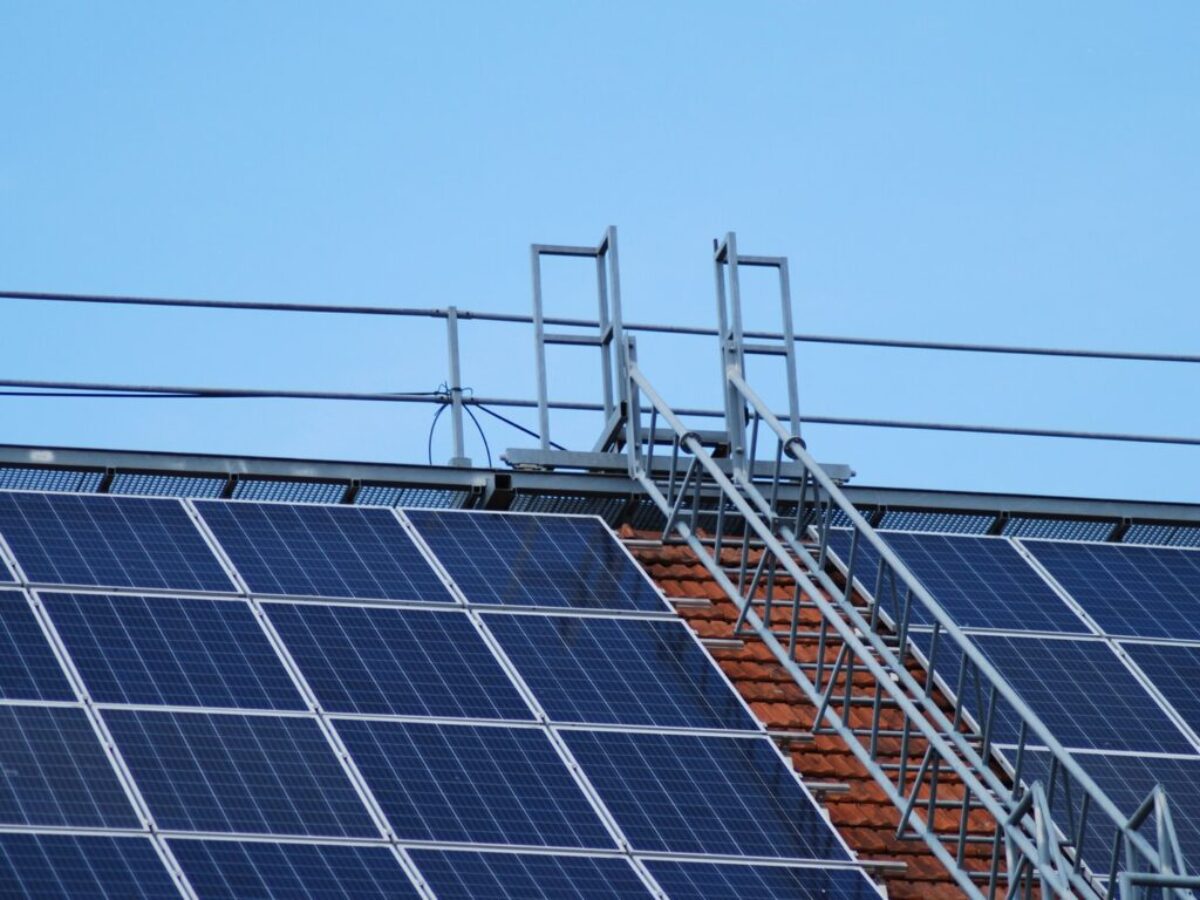 solar panels on gray metal frame under blue sky during daytime