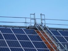 solar panels on gray metal frame under blue sky during daytime