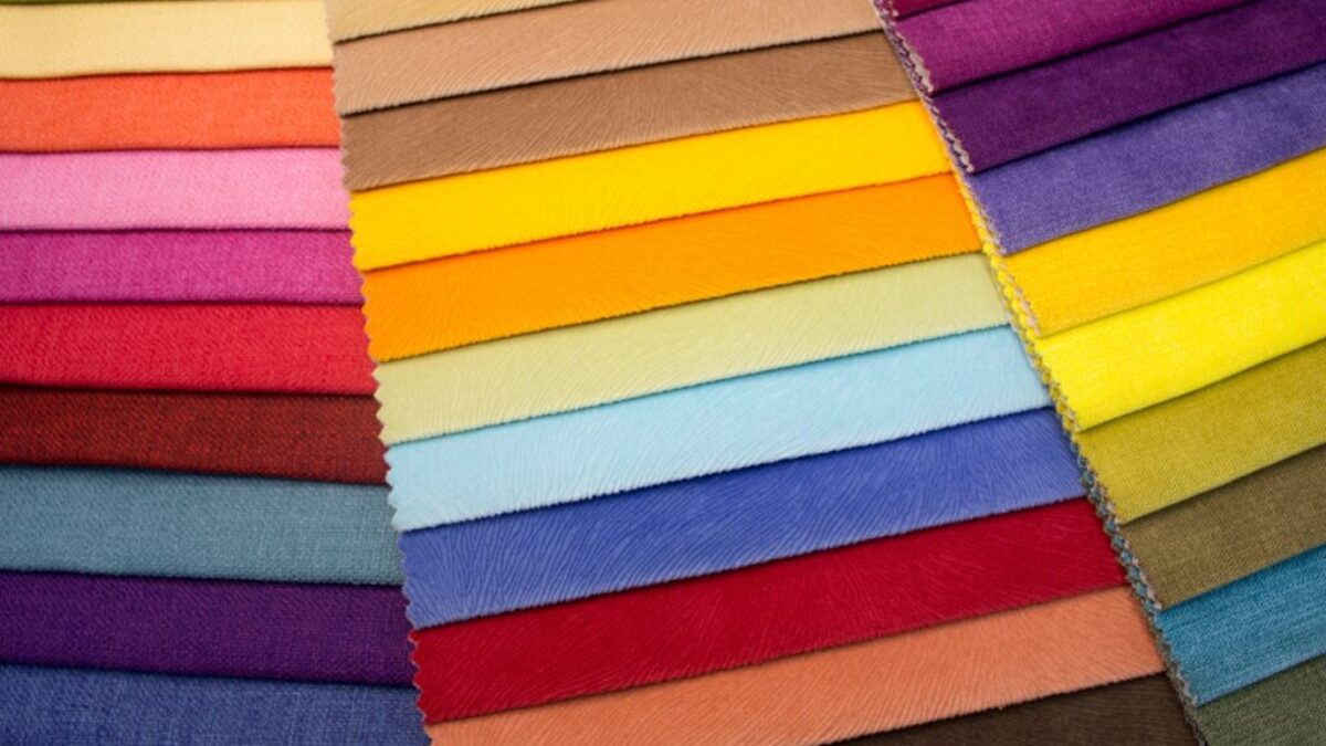 multi colored striped textile on brown wooden table