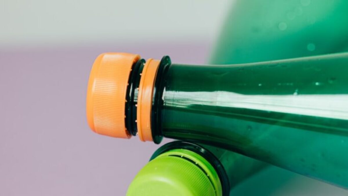 green bottle with yellow cap
