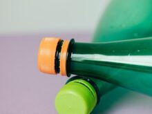 green bottle with yellow cap