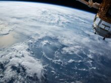 view of Earth and satellite
