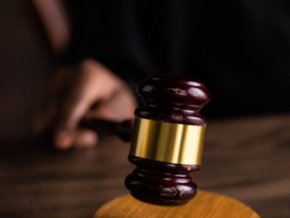 Brown and Gold Gavel on Brown Wooden Table