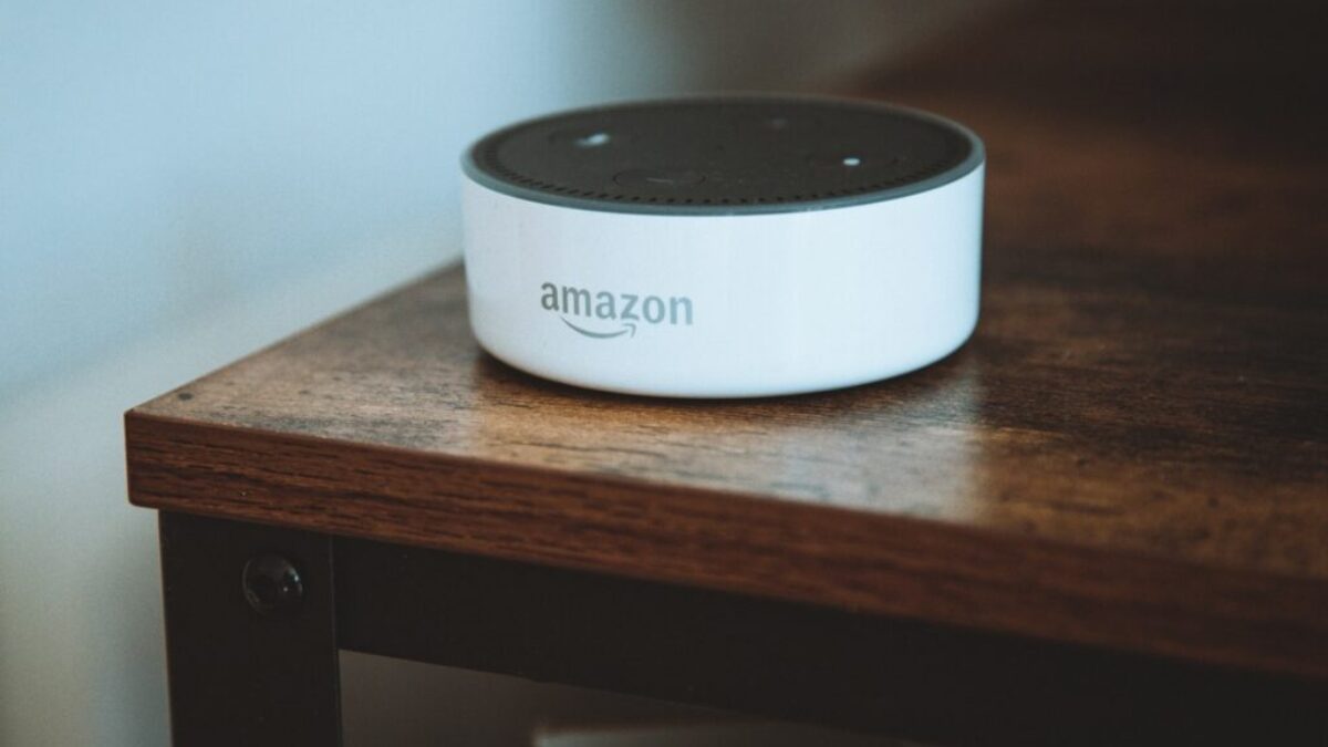 white and black round portable speaker