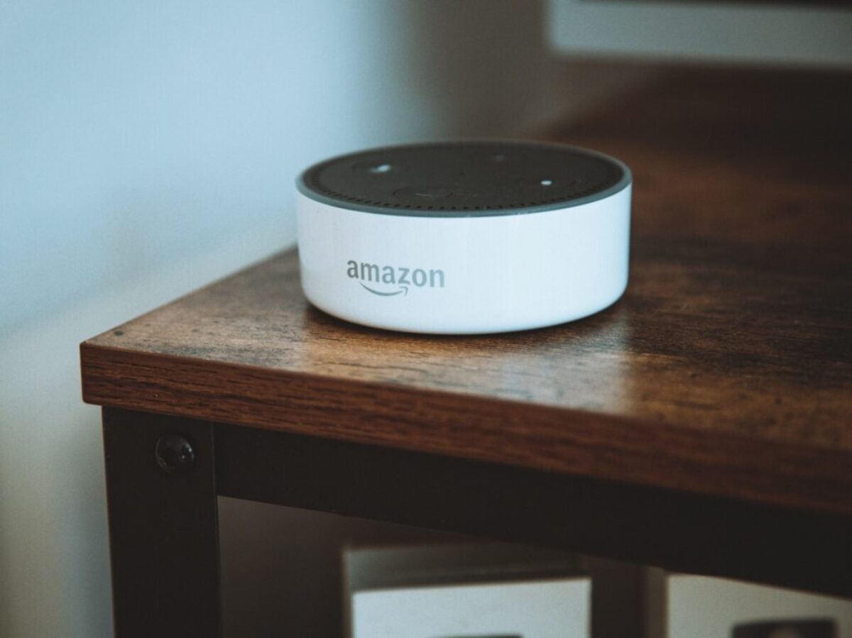 white and black round portable speaker
