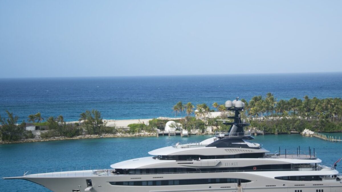 White and Blue Yacht on Body of Water