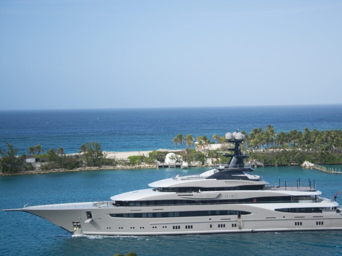 White and Blue Yacht on Body of Water