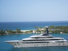 White and Blue Yacht on Body of Water