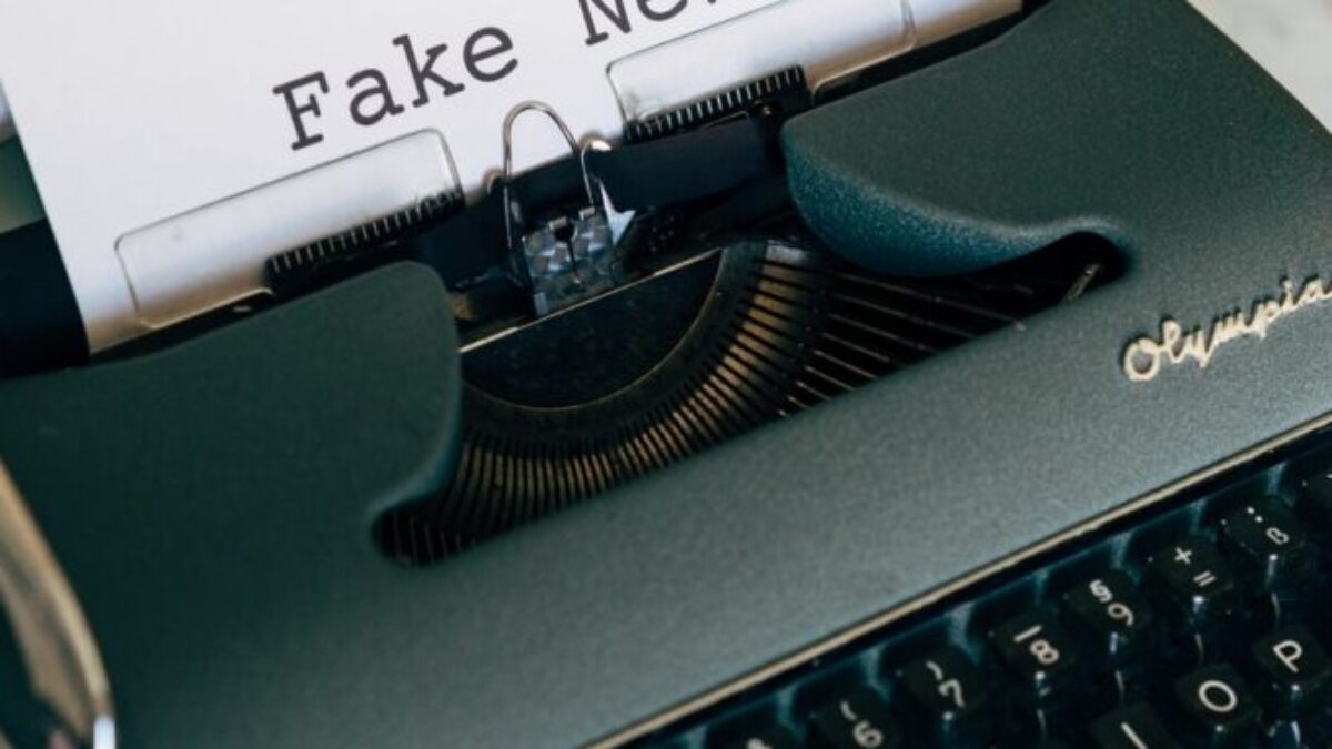 black and white typewriter on white table